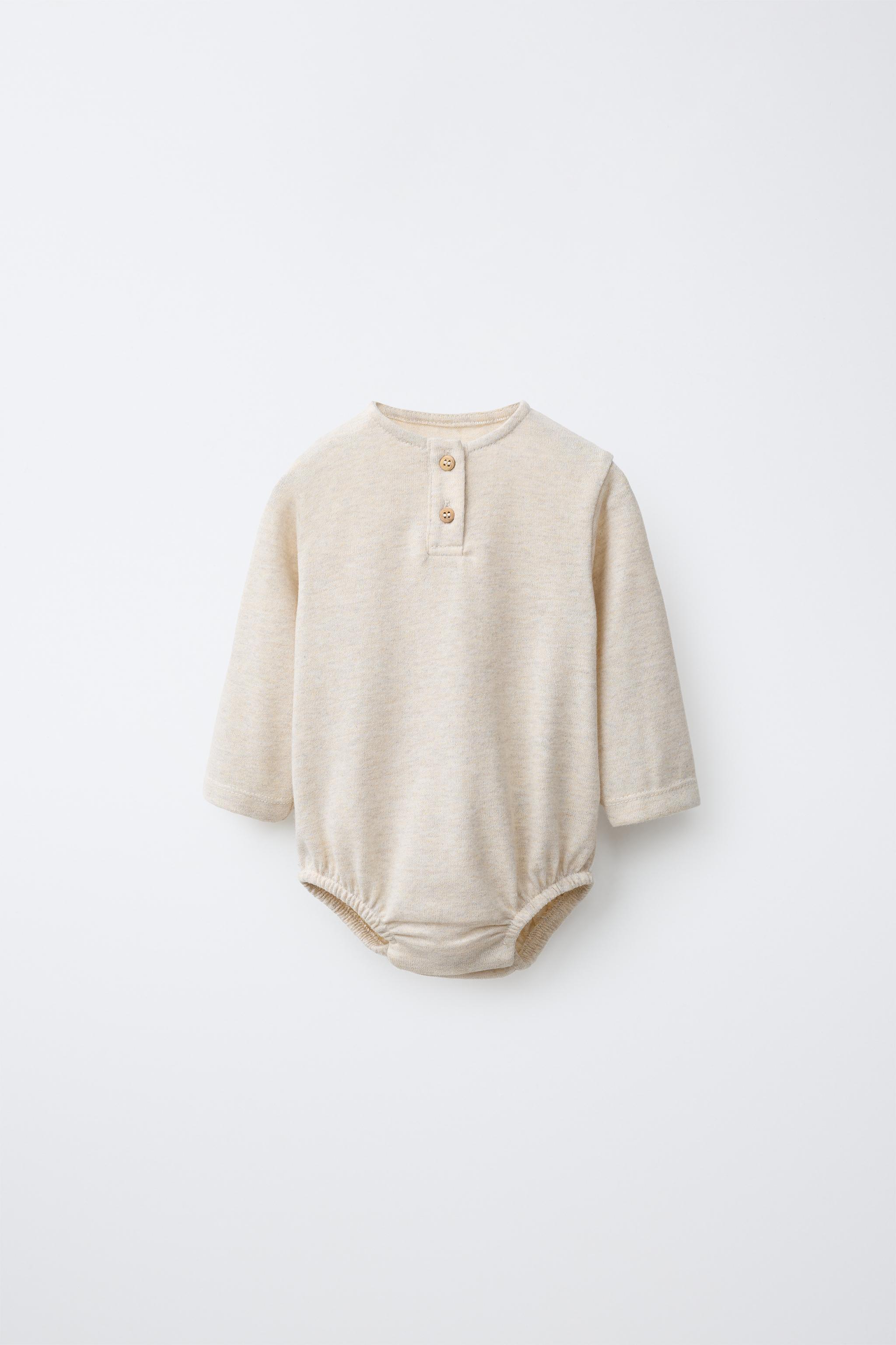 HENLEY NECK BODYSUIT — Mid-ecru