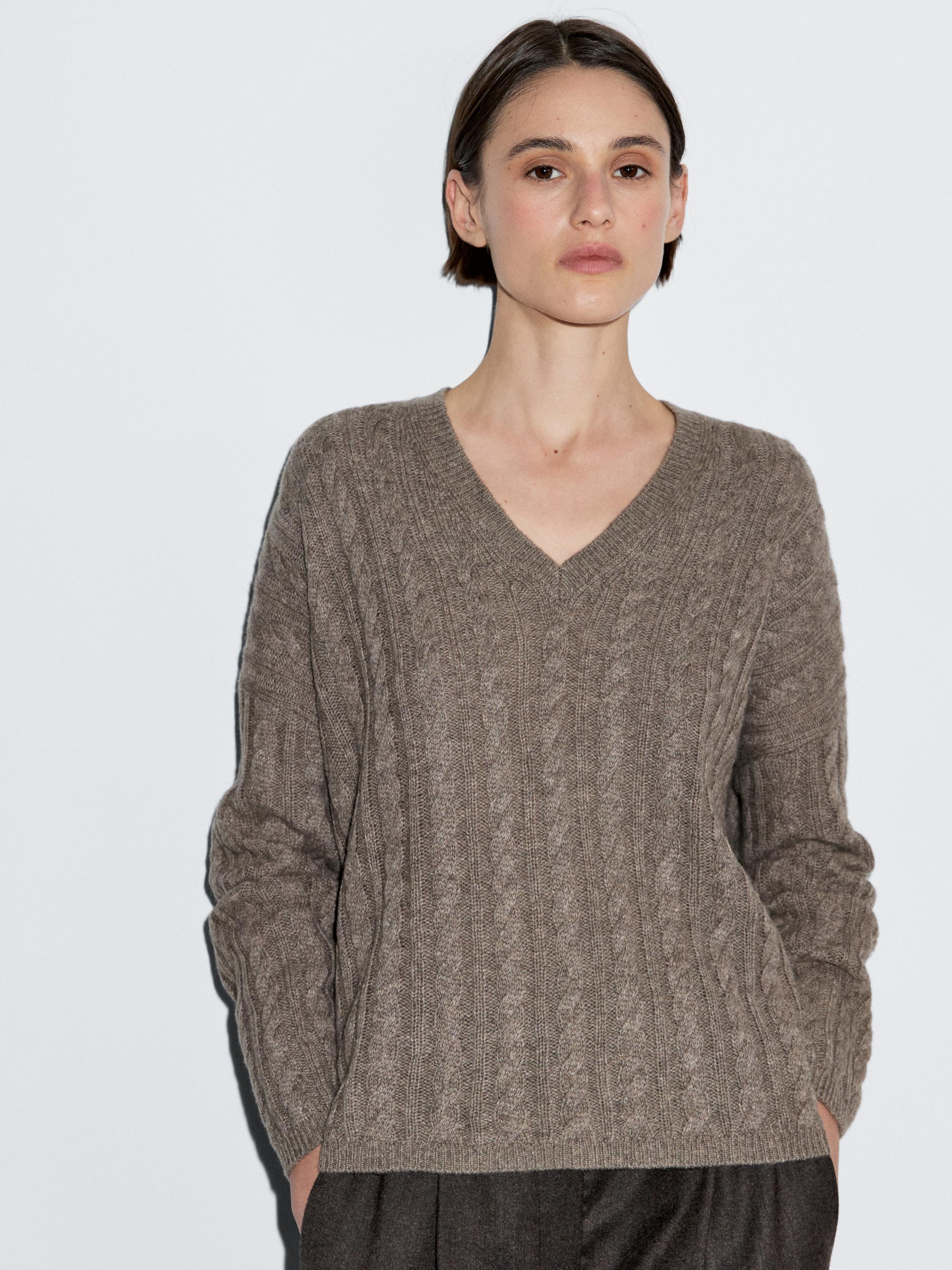 Cable-knit V-neck sweater