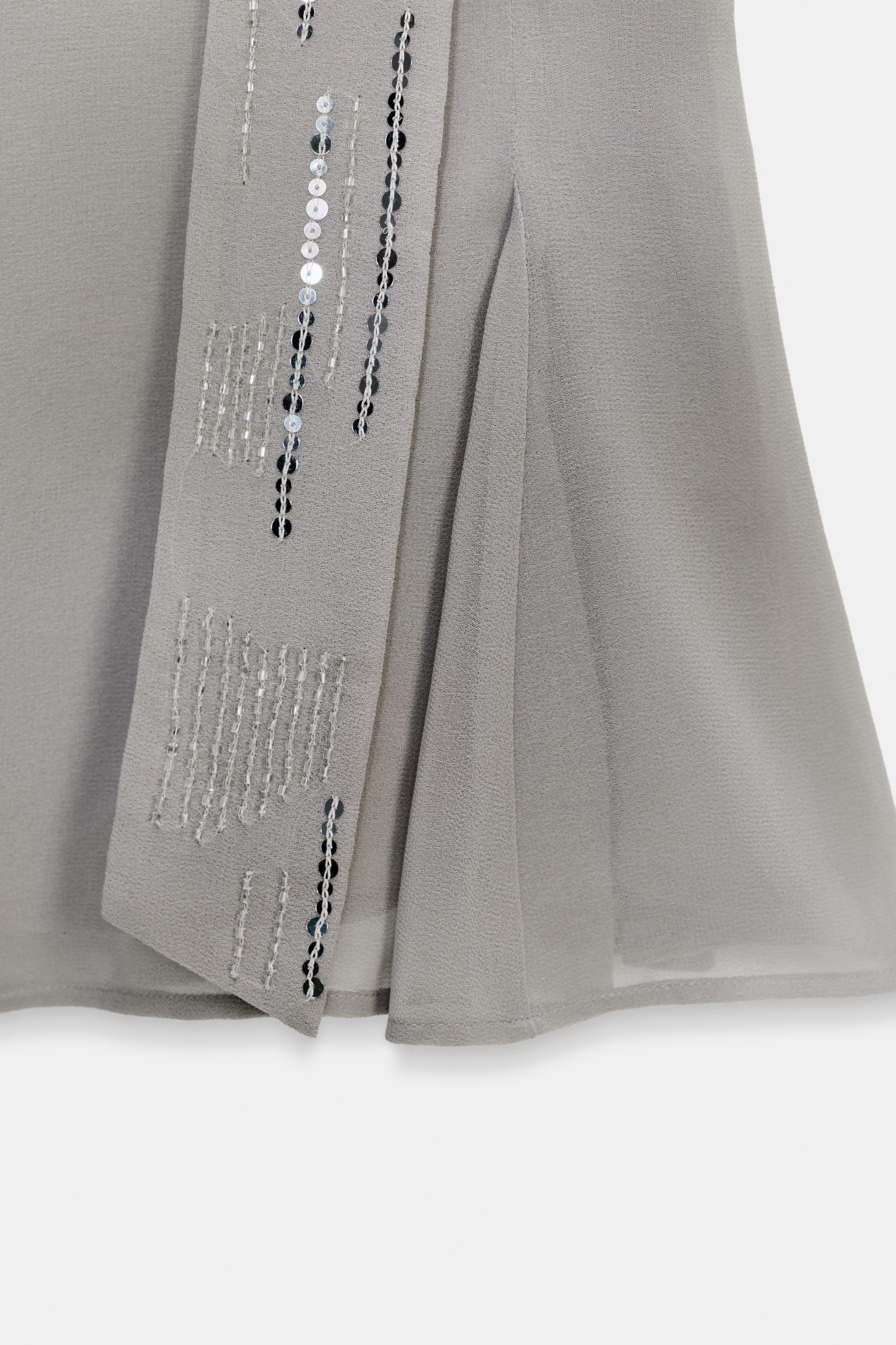 ASYMMETRIC SEQUIN GEORGETTE TOP