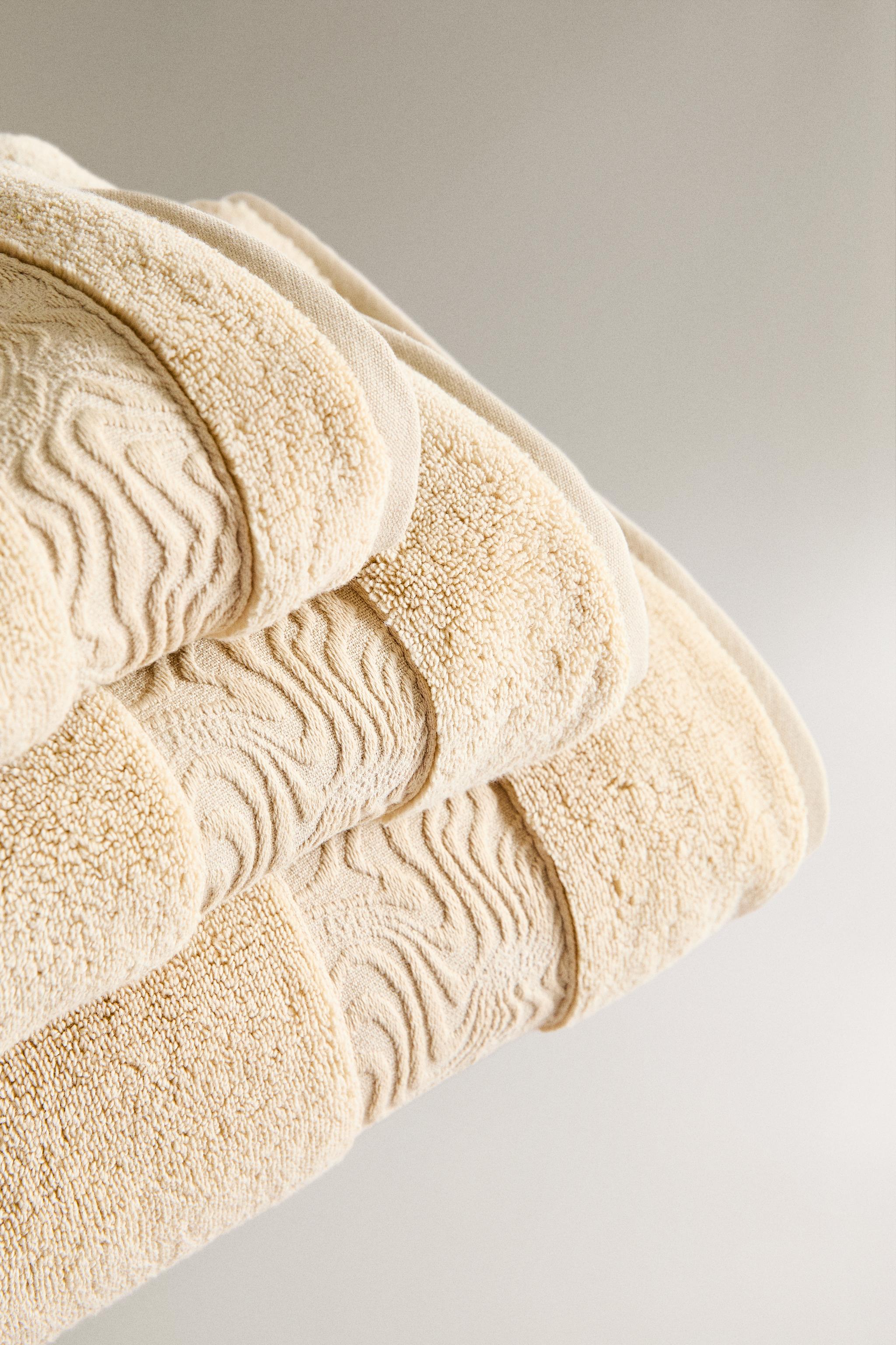BATH TOWEL WITH MARBLE BORDER