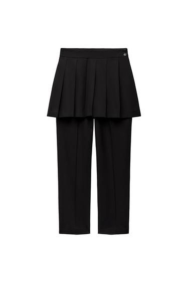 BOX PLEAT SKIRT OVER TROUSERS