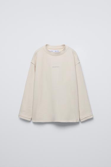 CAMISETA TEXTO BORDADO - Blanco roto de Zara
