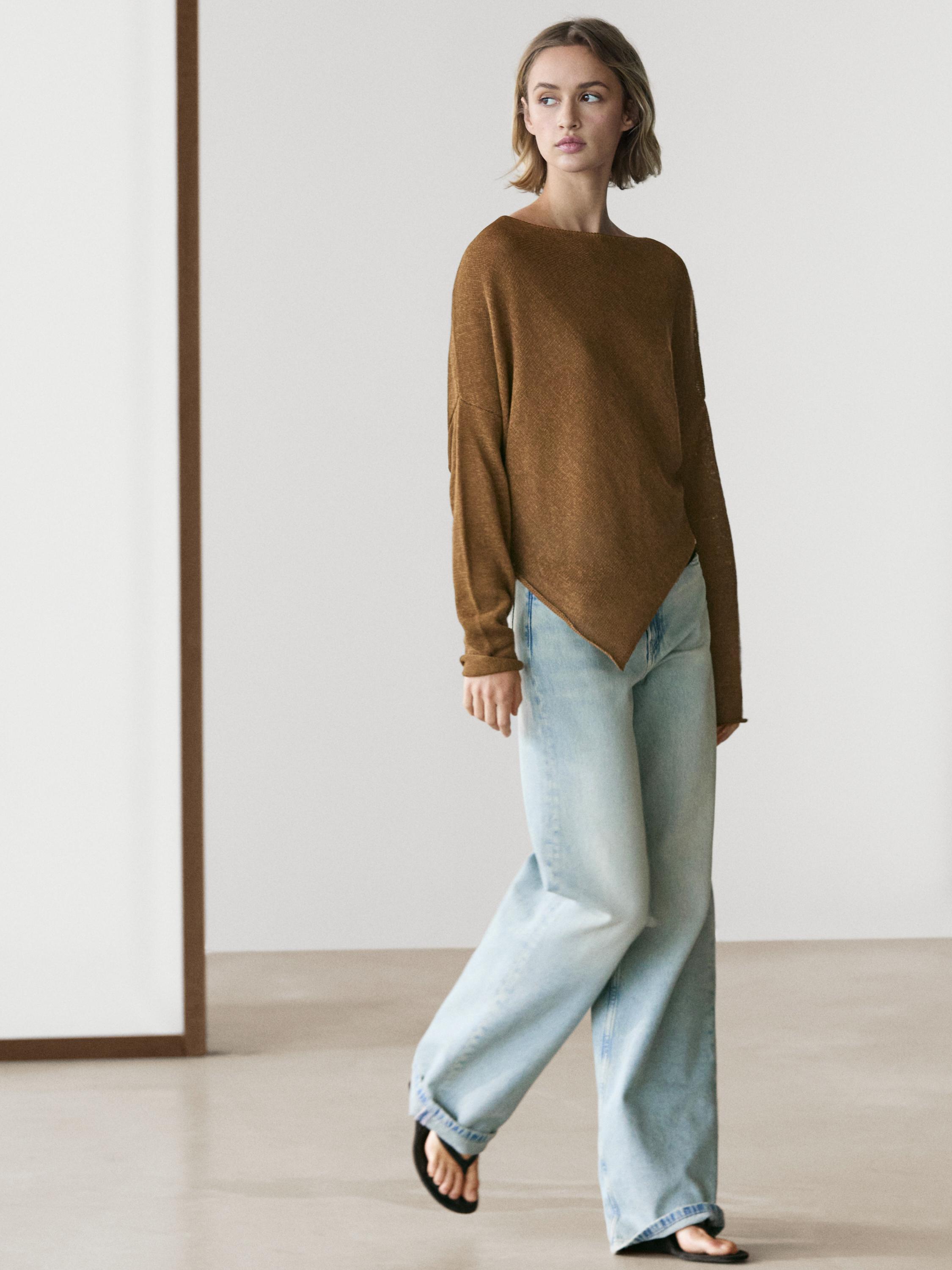Asymmetric knit cape sweater