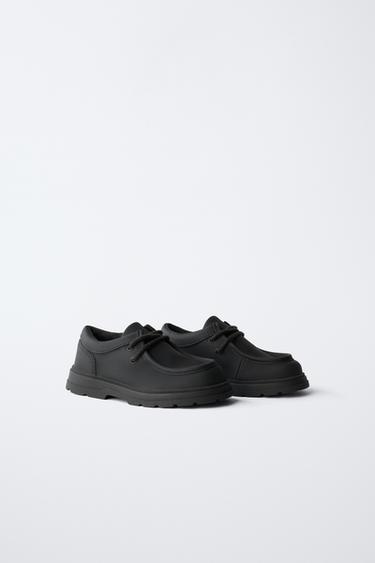 CHAUSSURES À BORD LARGE AVEC LISERÉ - Noir de Zara - Image 1