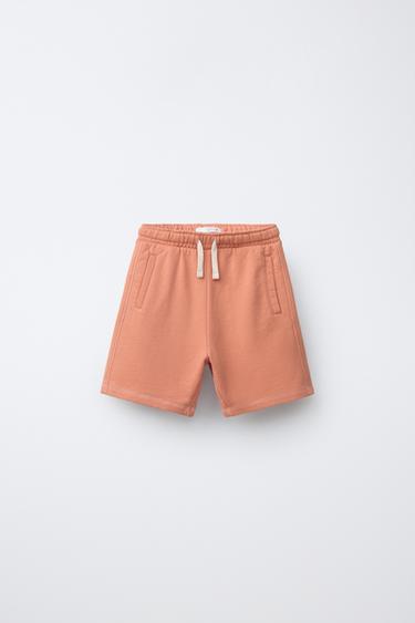 BERMUDA EN MOLLETON TEINT SUR PIÈCE AVEC LOGO - Orange de Zara