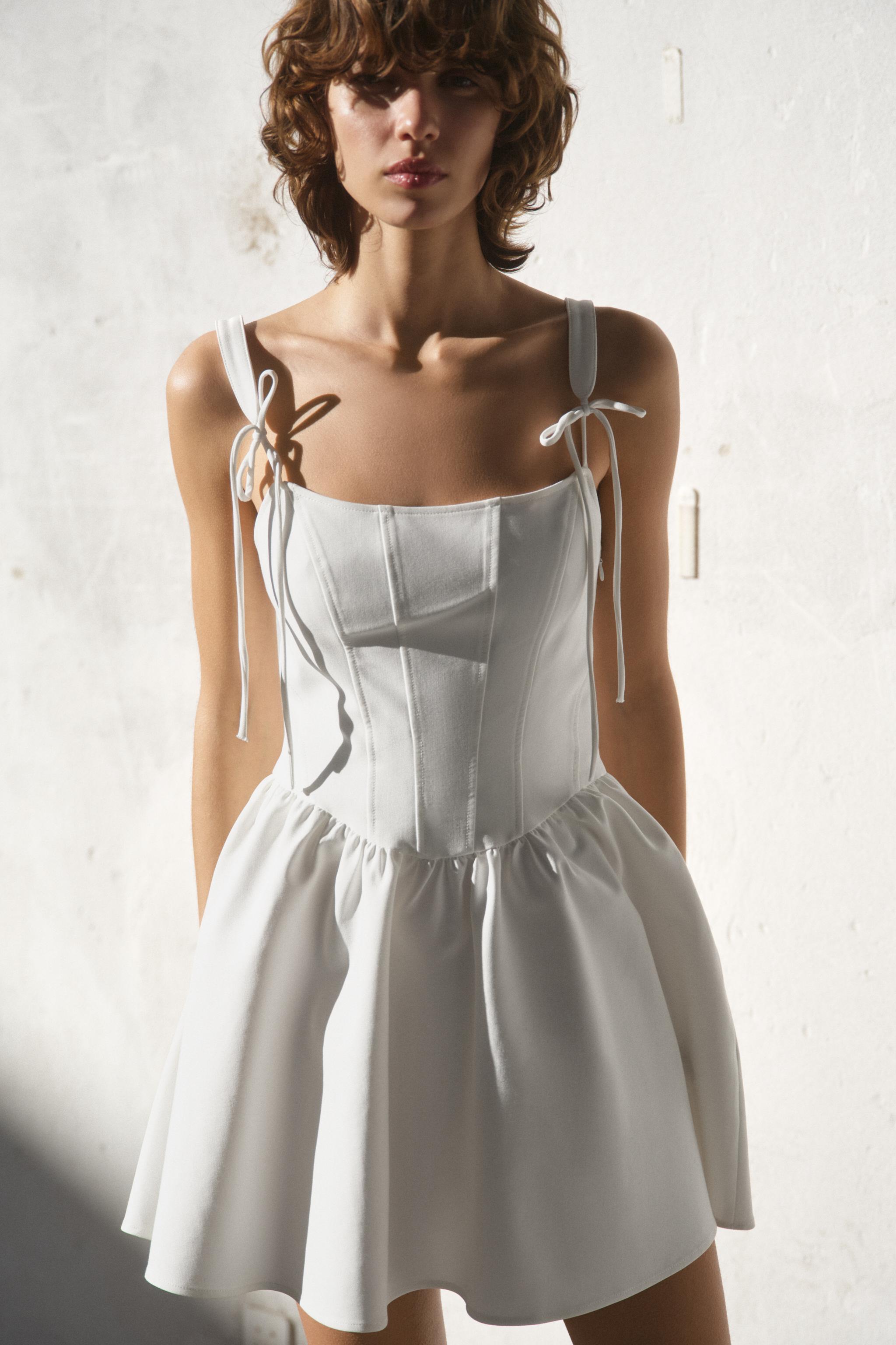 CORSETRY-INSPIRED VOLUME DRESS