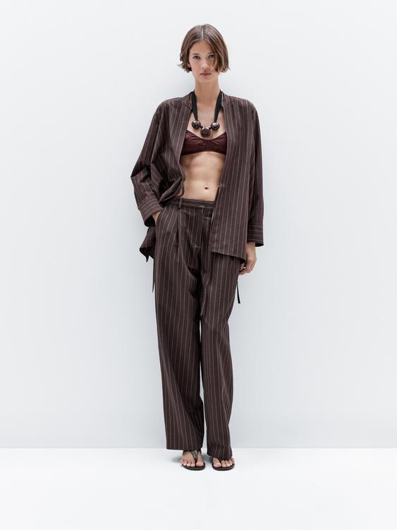Darted pinstripe trousers