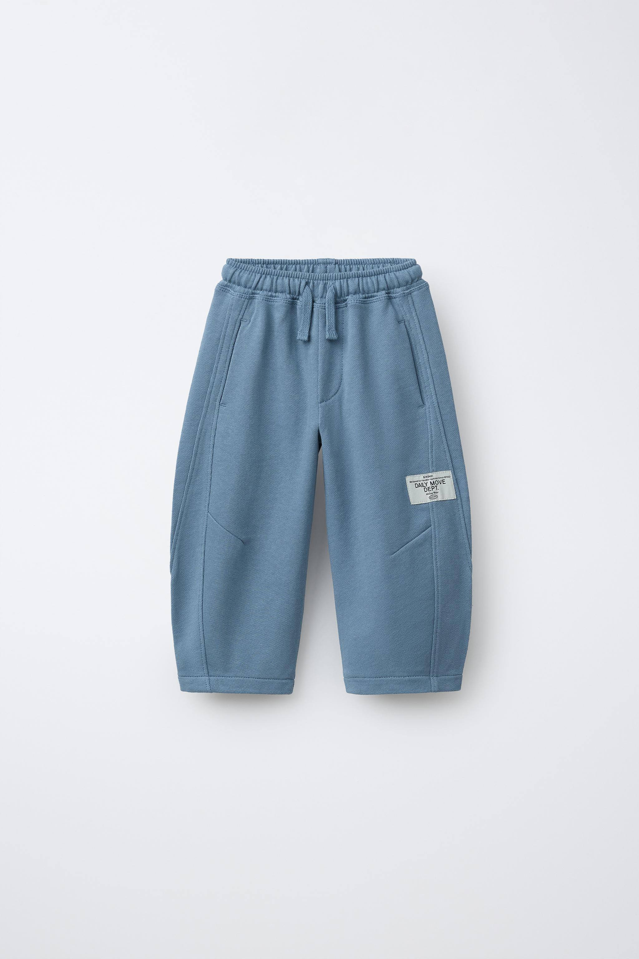 PANTALON BARREL EN MOLLETON AVEC ÉTIQUETTE