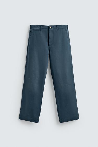 WASHED DISTRESSED CHINO TROUSERS - Pastel blue by Zara