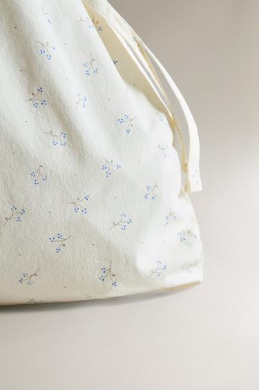 CHILDREN'S FLORAL LAUNDRY BAG - Butter by Zara - Image 1