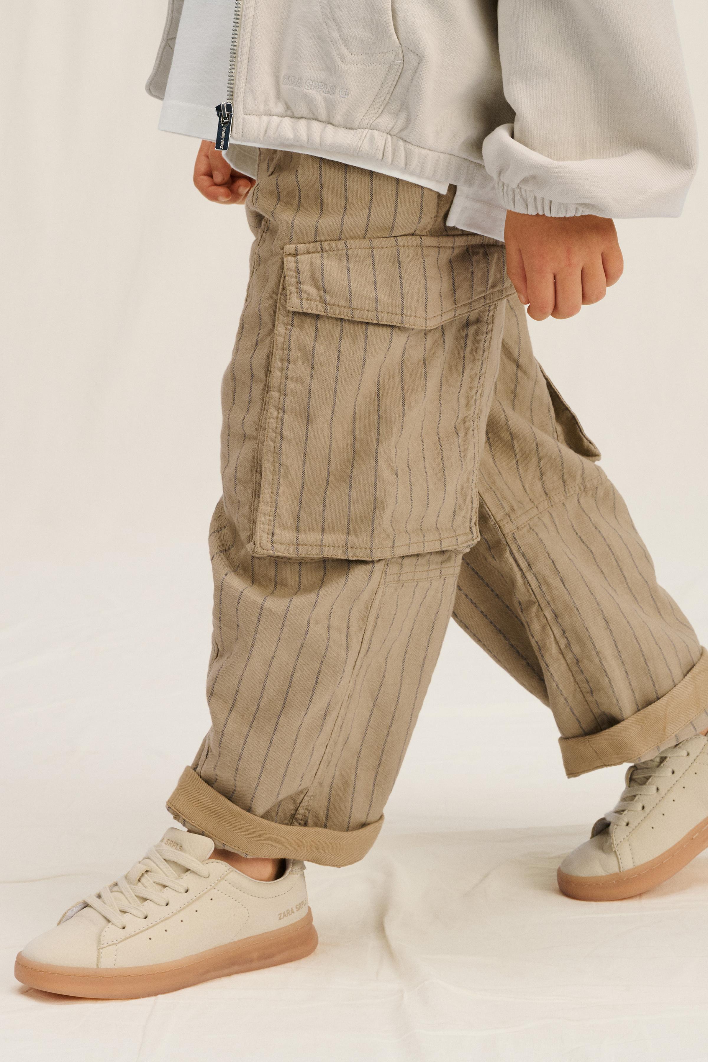 レア！THE REDTHREAD S cover cargo pants Red Star Grommet Cargo Pants | Hot Topic