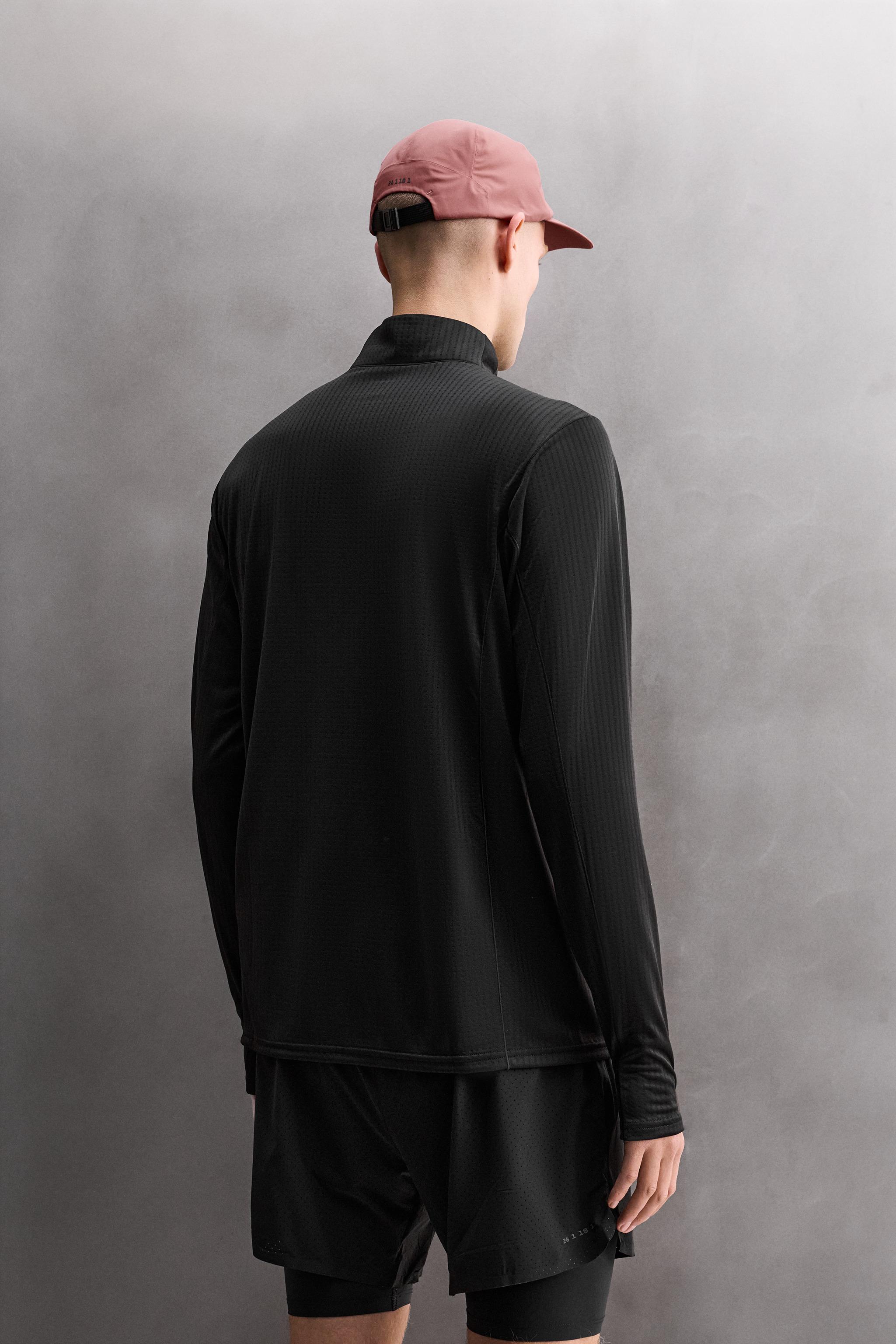 COMBINATION POCKET QUARTER-ZIP SWEATSHIRT