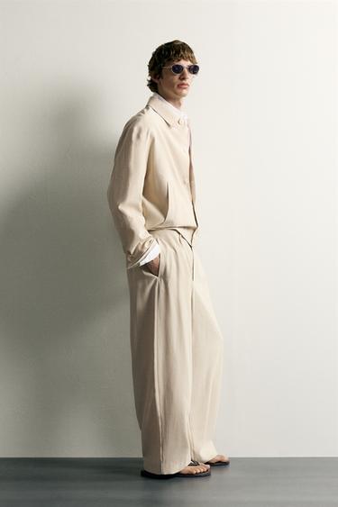 RELAXED FIT PLEATED TROUSERS - Beige by Zara