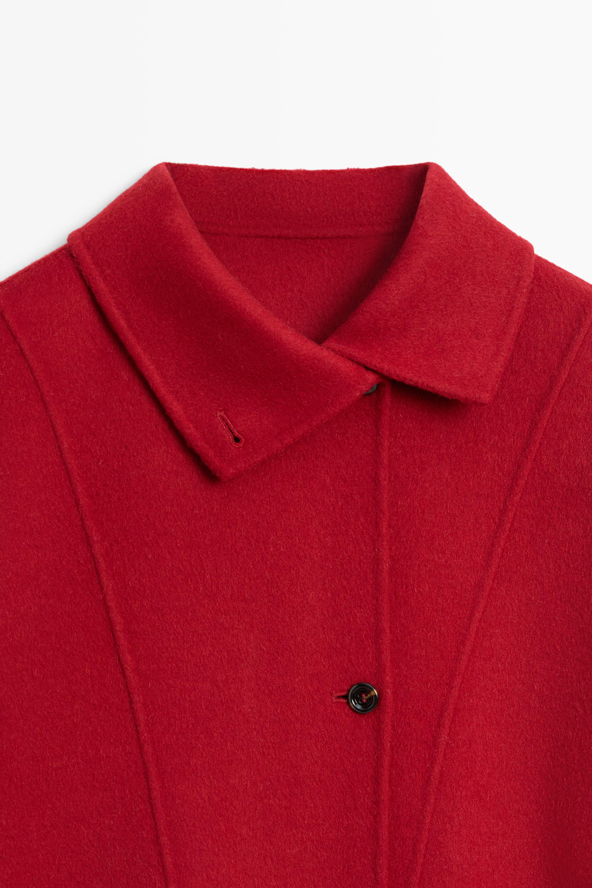 Long coat with asymmetrical collar detail