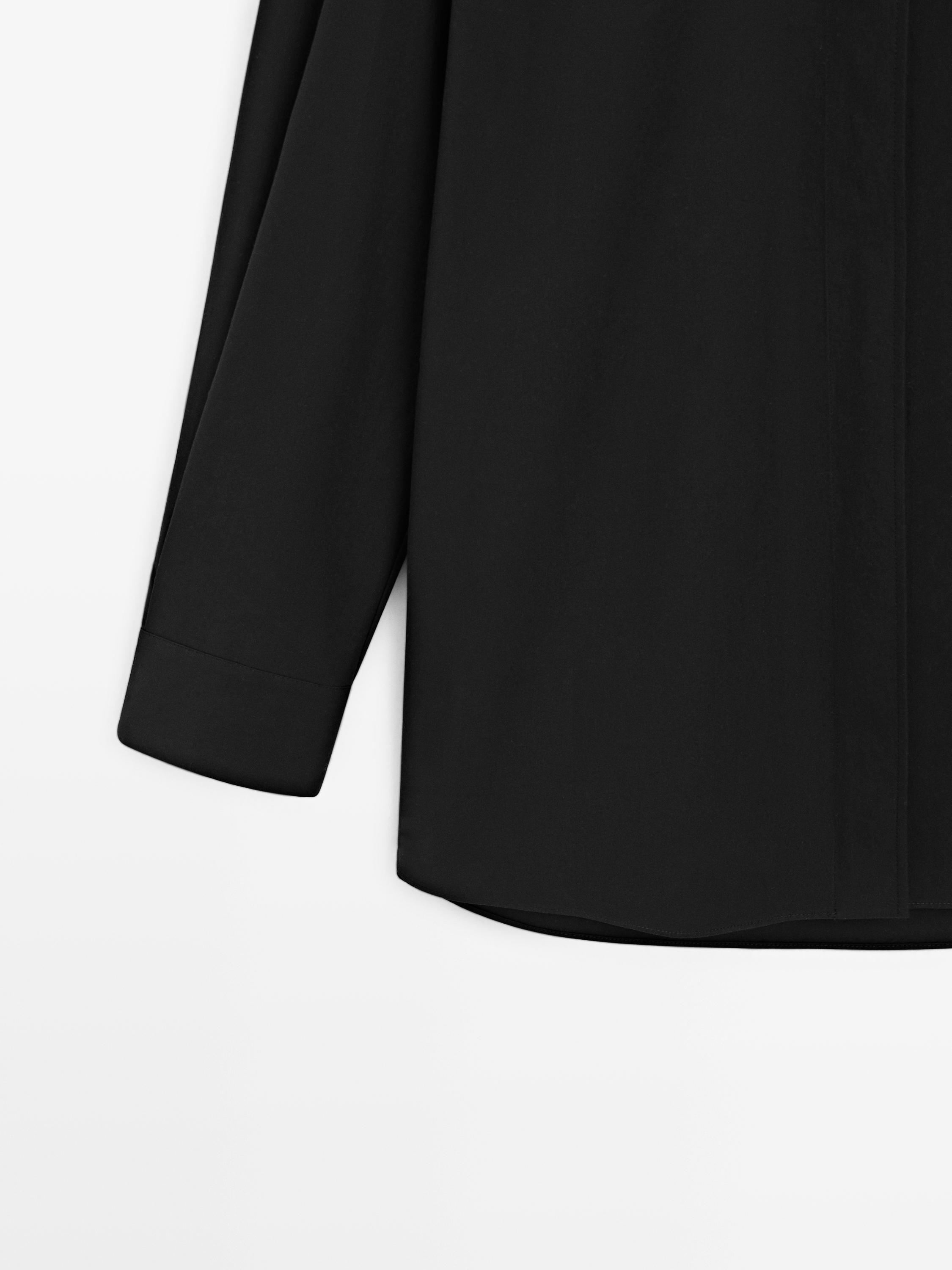 High neck shirt with strap detail