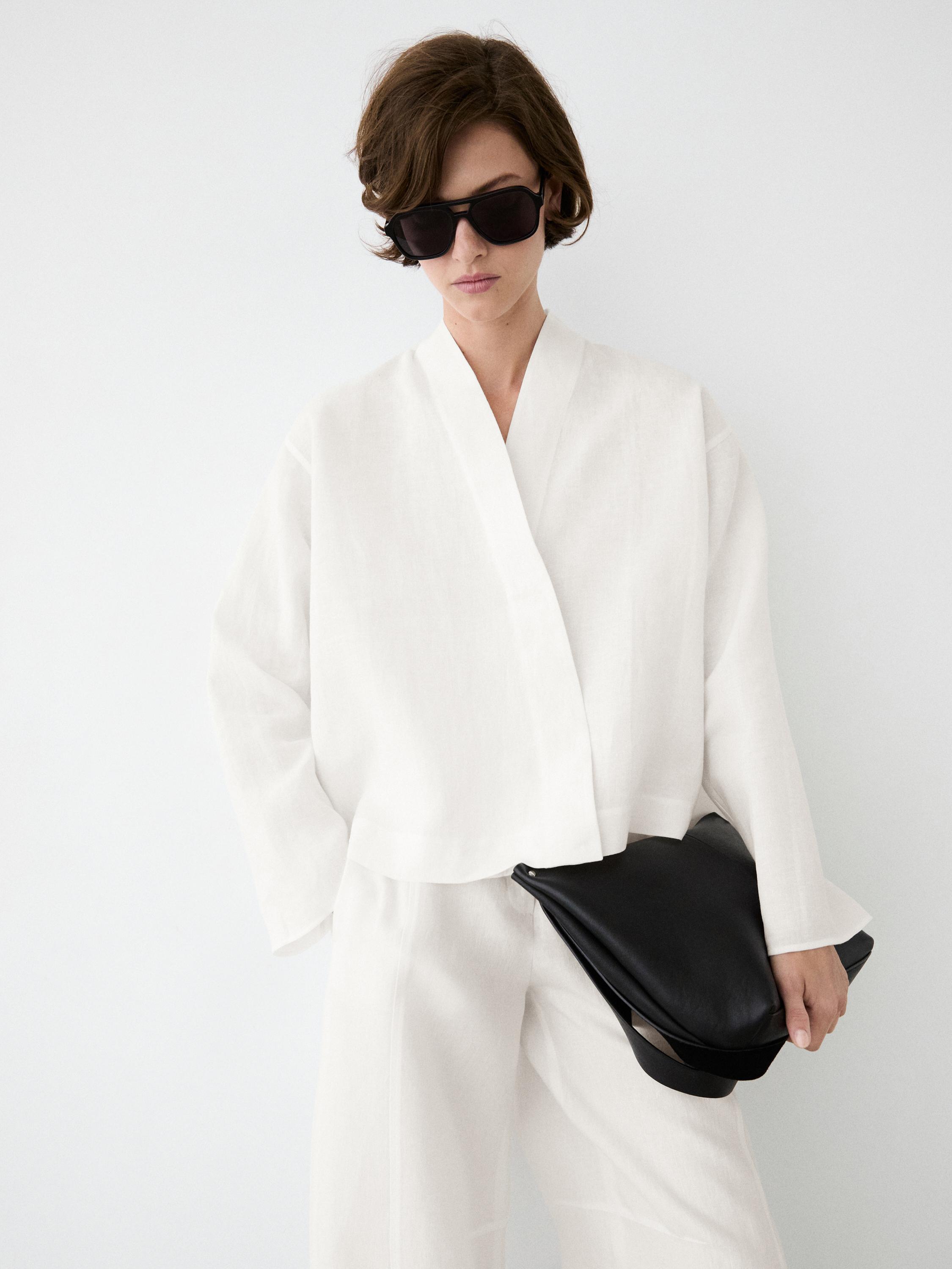 Flowing linen blouse with surplice neckline