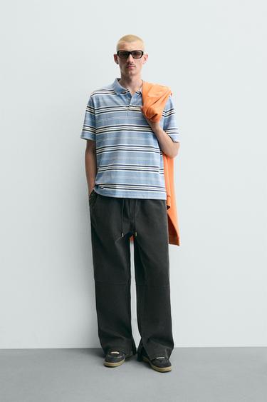 PANTALÓN RELAXED FIT TACHAS EFECTO PIEL - Negro de Zara - Imagen 0