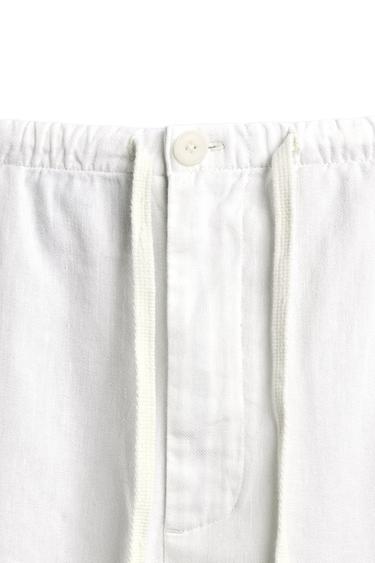 RELAXED FIT LINEN BLEND TROUSERS - White by Zara