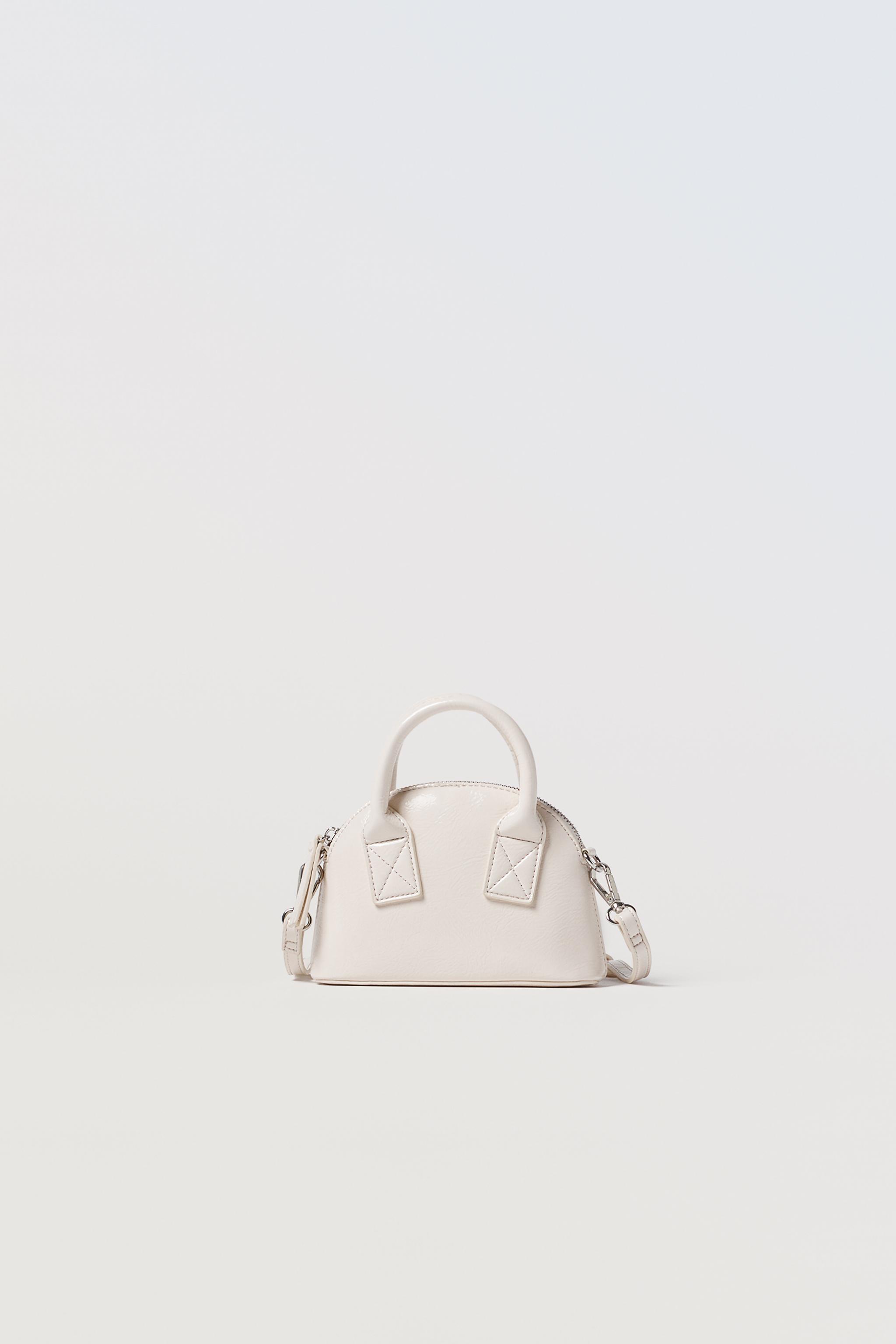 White discount patent handbag