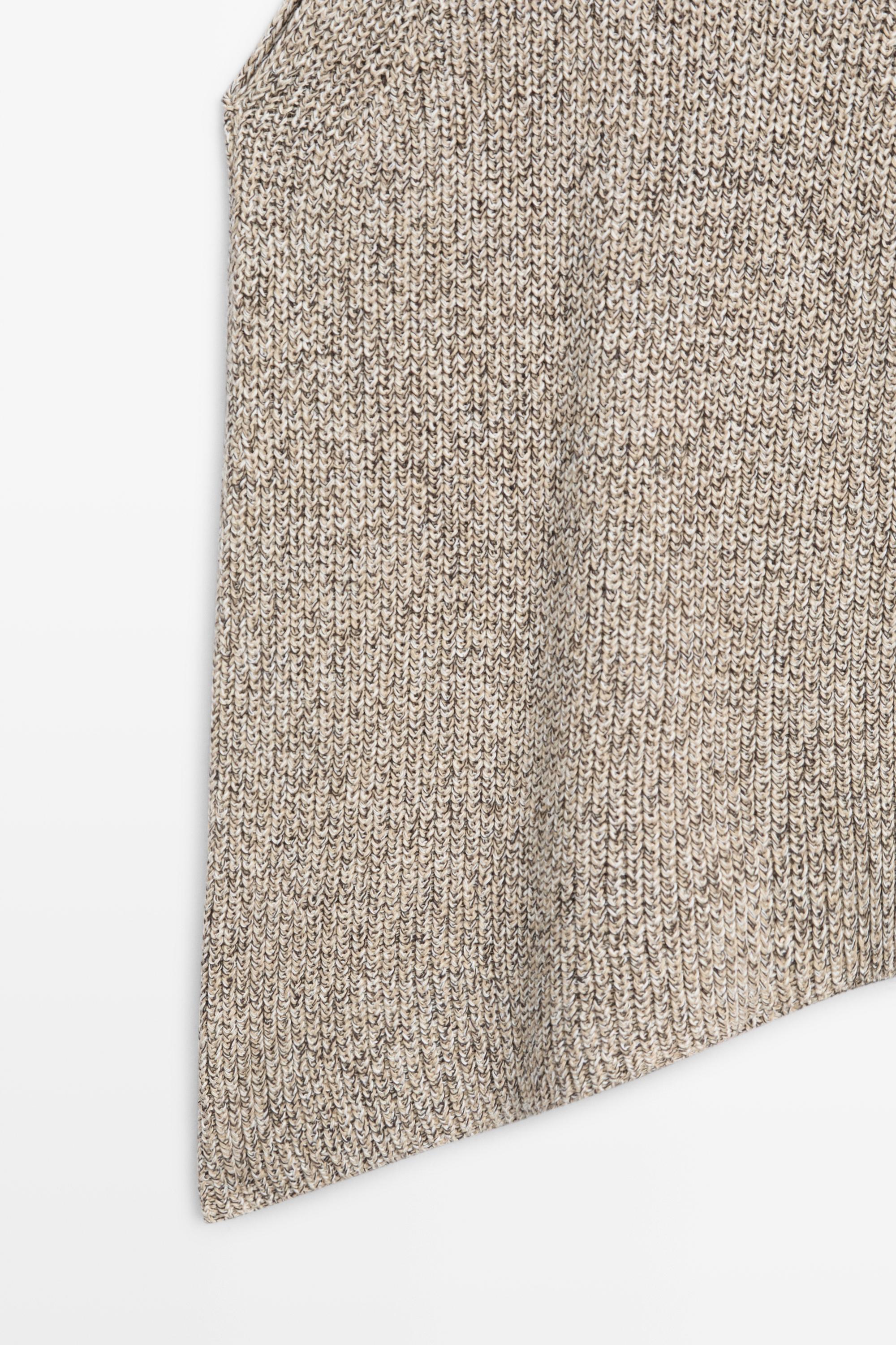 Top asymétrique en maille