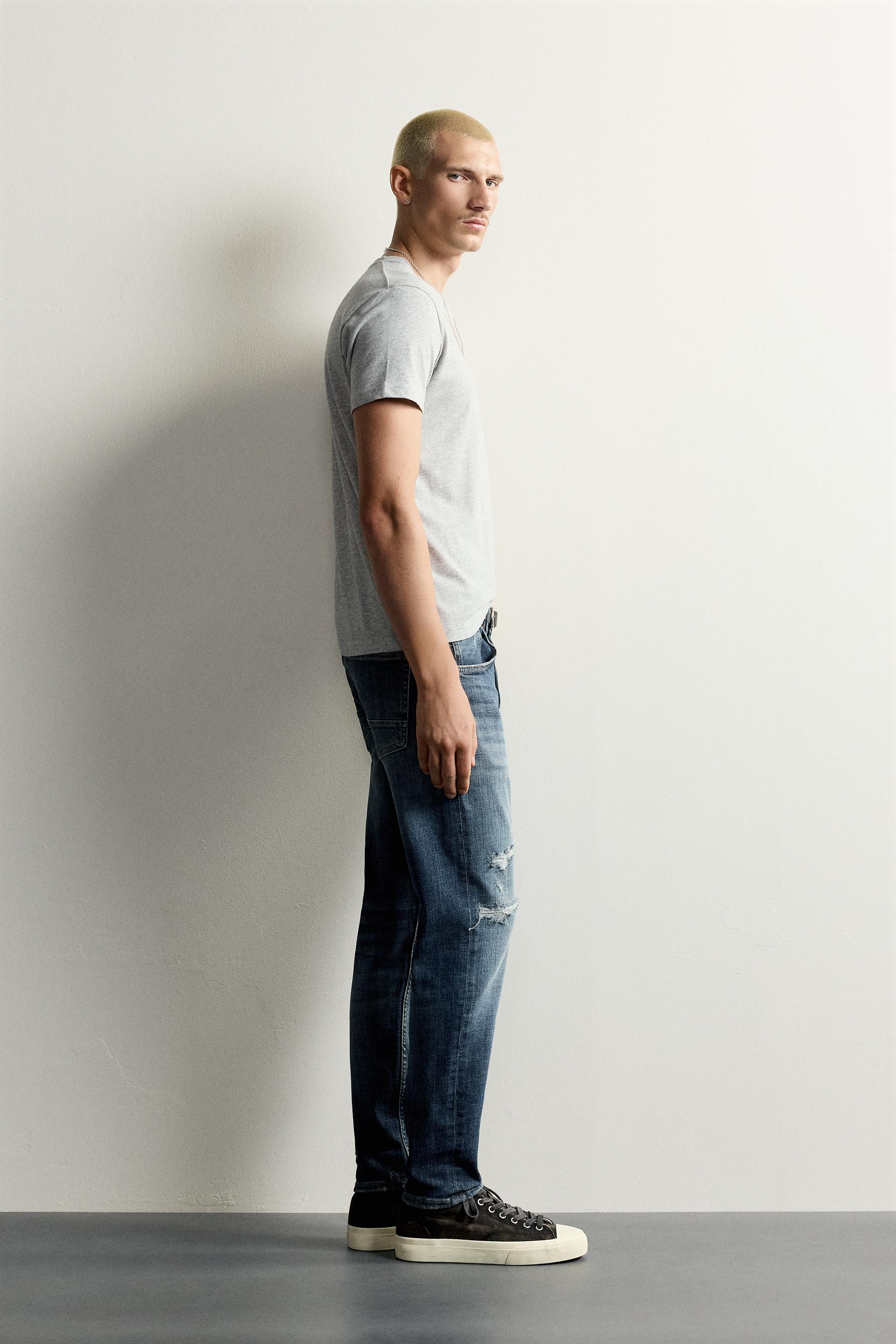 DISTRESSED SKINNY FIT JEANS