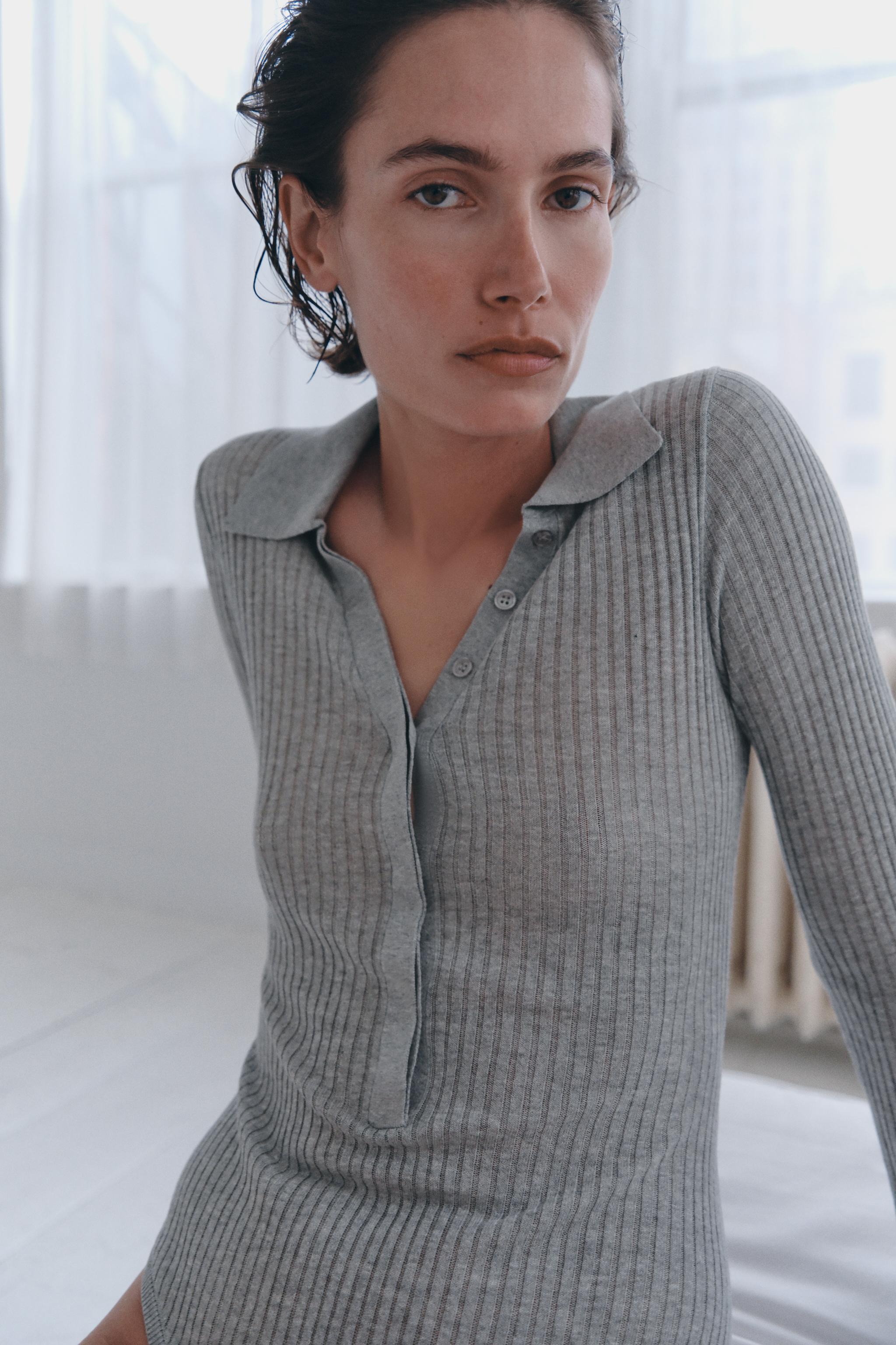 BUTTONED KNIT BODYSUIT