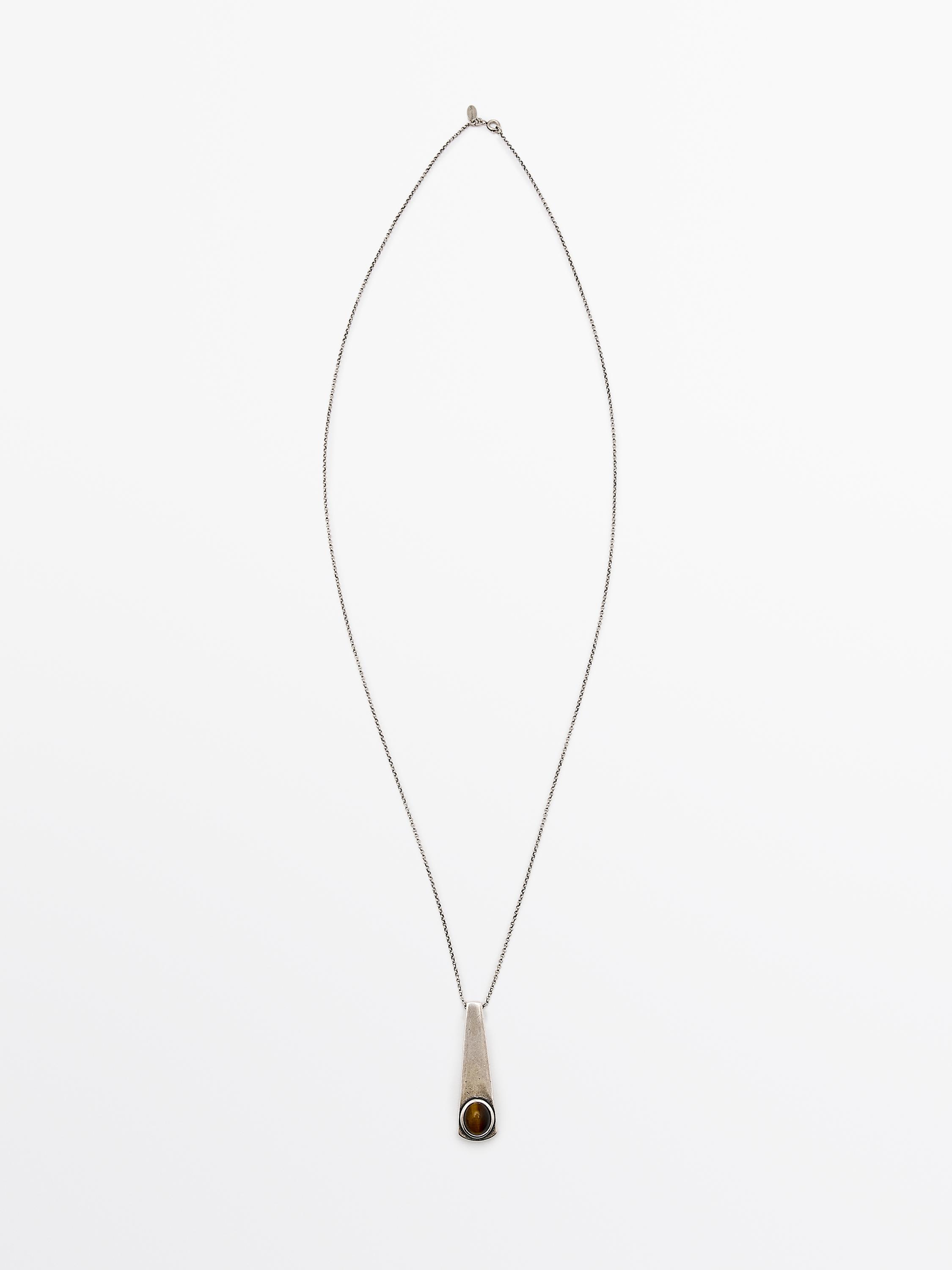 Pendentif géométrique avec pierre