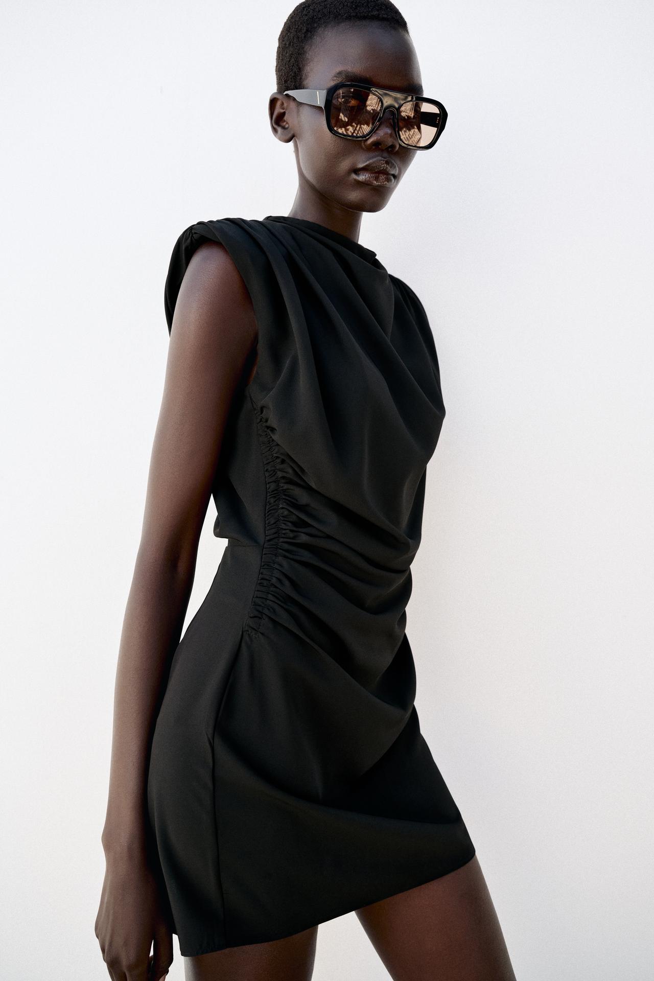 DRAPED SHOULDER PAD MINI DRESS — Black