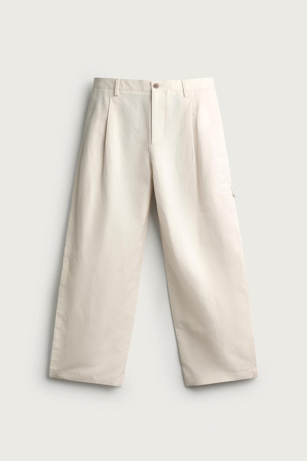 RELAXED FIT PLEATED TROUSERS