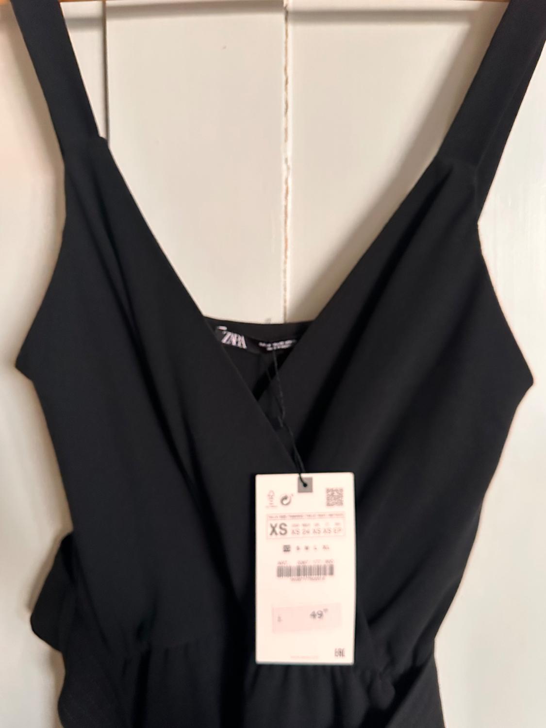 JUMPSUIT WITH HEM LOOPS - Image 6