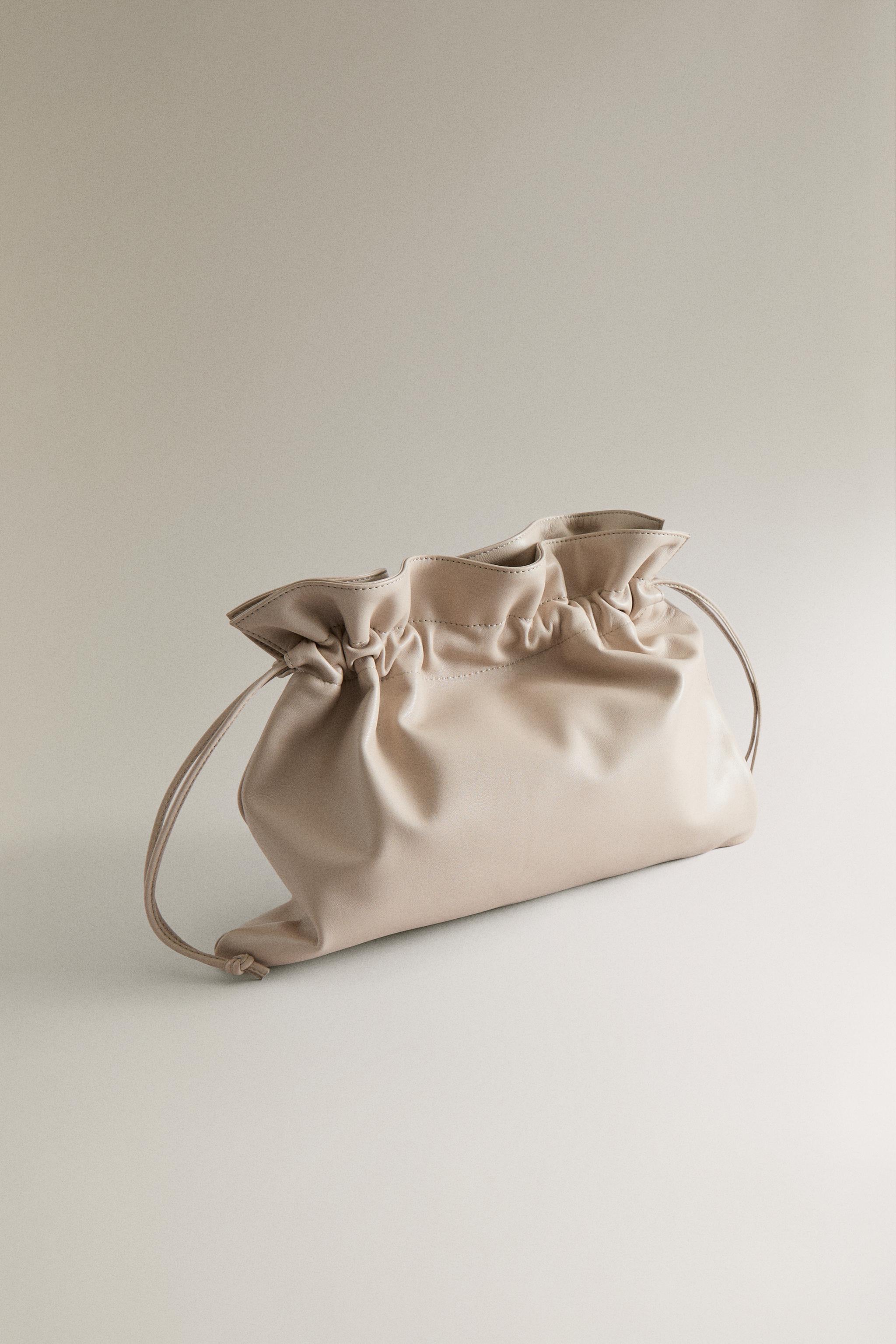 LARGE LEATHER CLUTCH — Beige