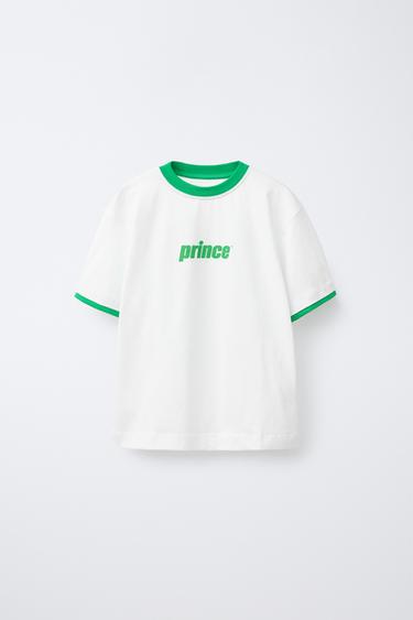 Zara MAJICA SA PRINCE ® PRINTOM – Bela