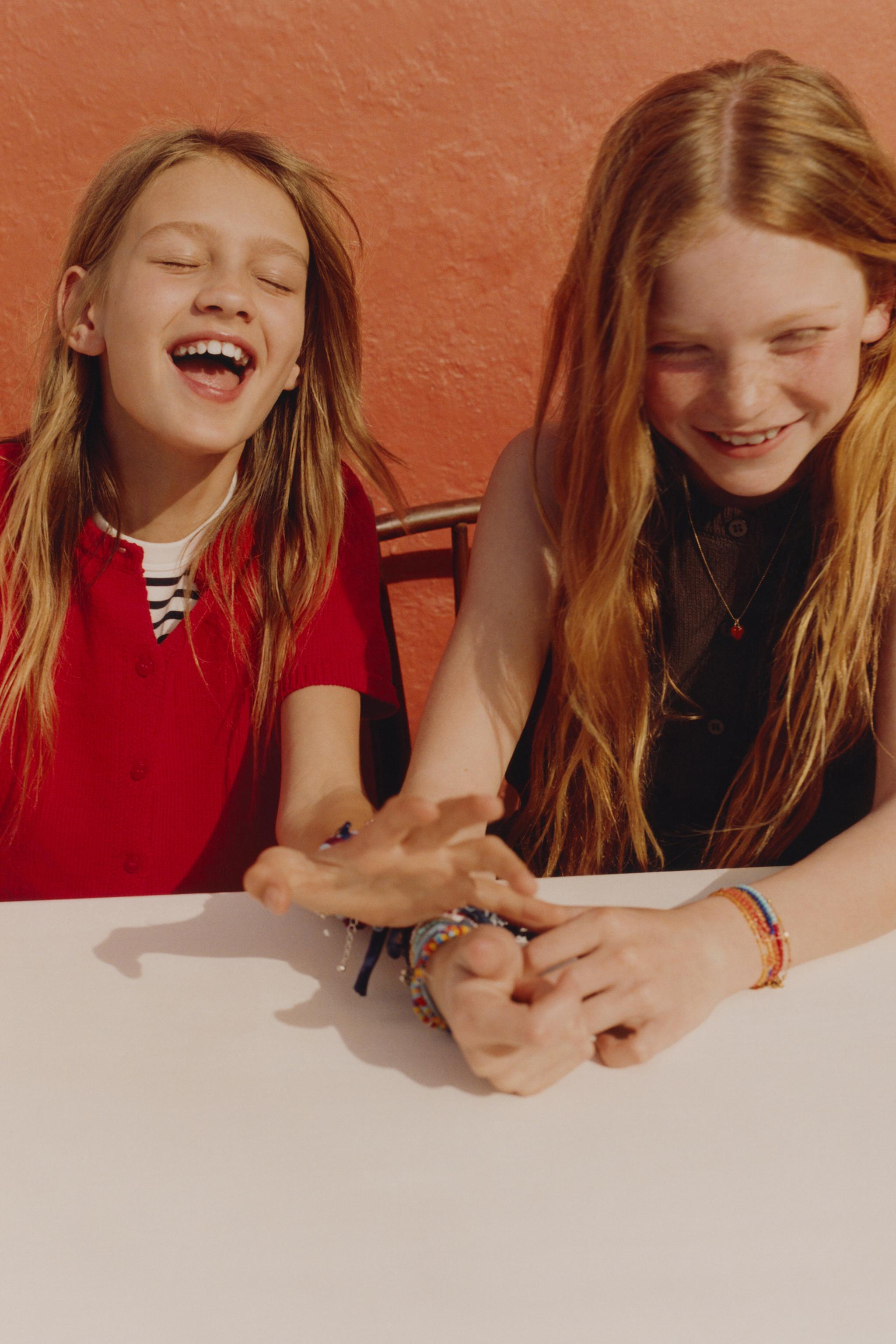 SHORT SLEEVE KNIT CARDIGAN