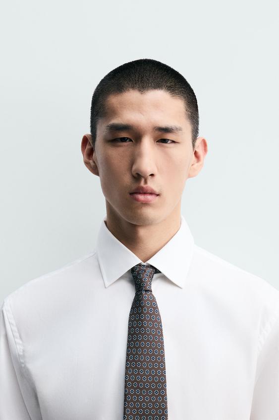 100% SILK GEOMETRIC JACQUARD TIE