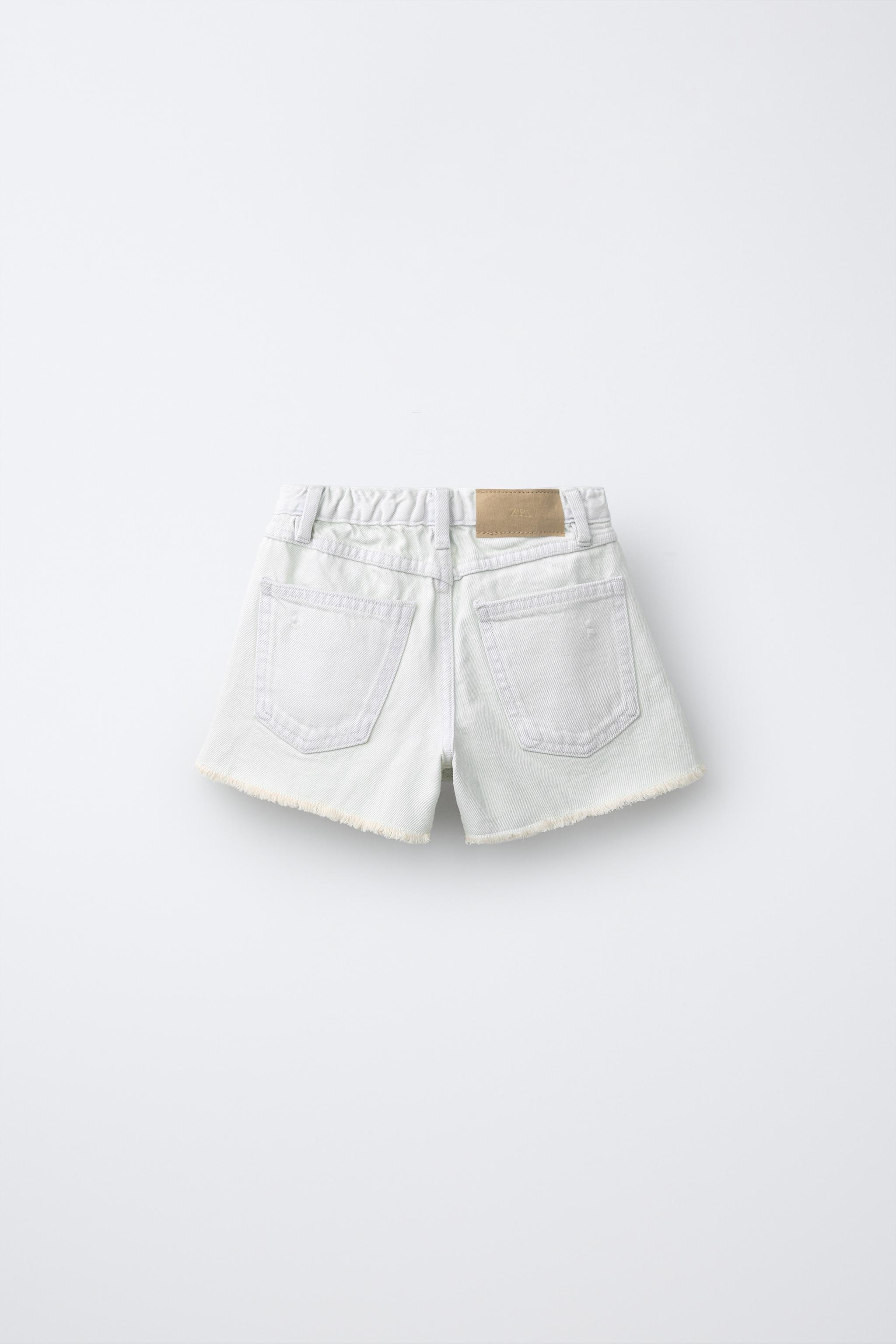 RIPPED DENIM SHORTS — Sky blue