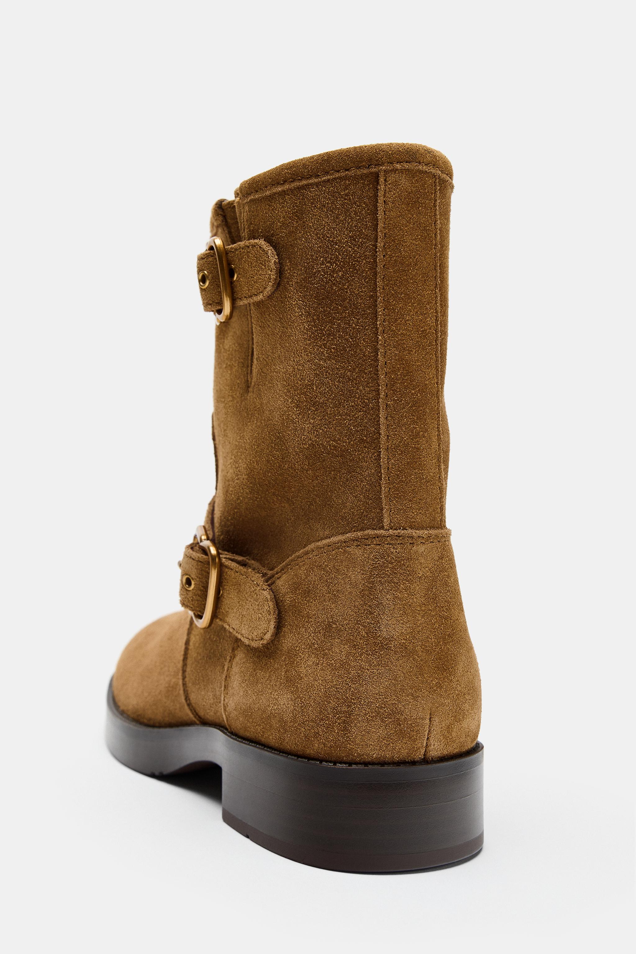 BOTTINES À BOUCLES EN CROÛTE DE CUIR