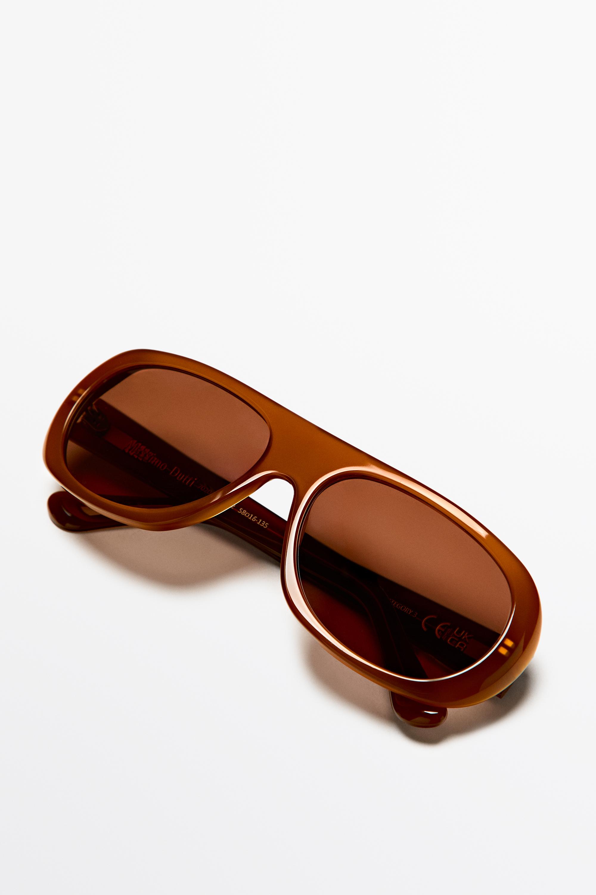 Lunettes de soleil enveloppantes