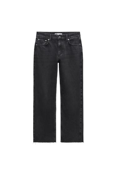 Front view of black trousers with front pockets and a straight cut.