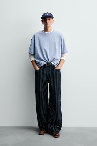 CAMISETA PARCHES CHAMPION ® X ZARA - Azul vigoré de Zara - Imagen 0