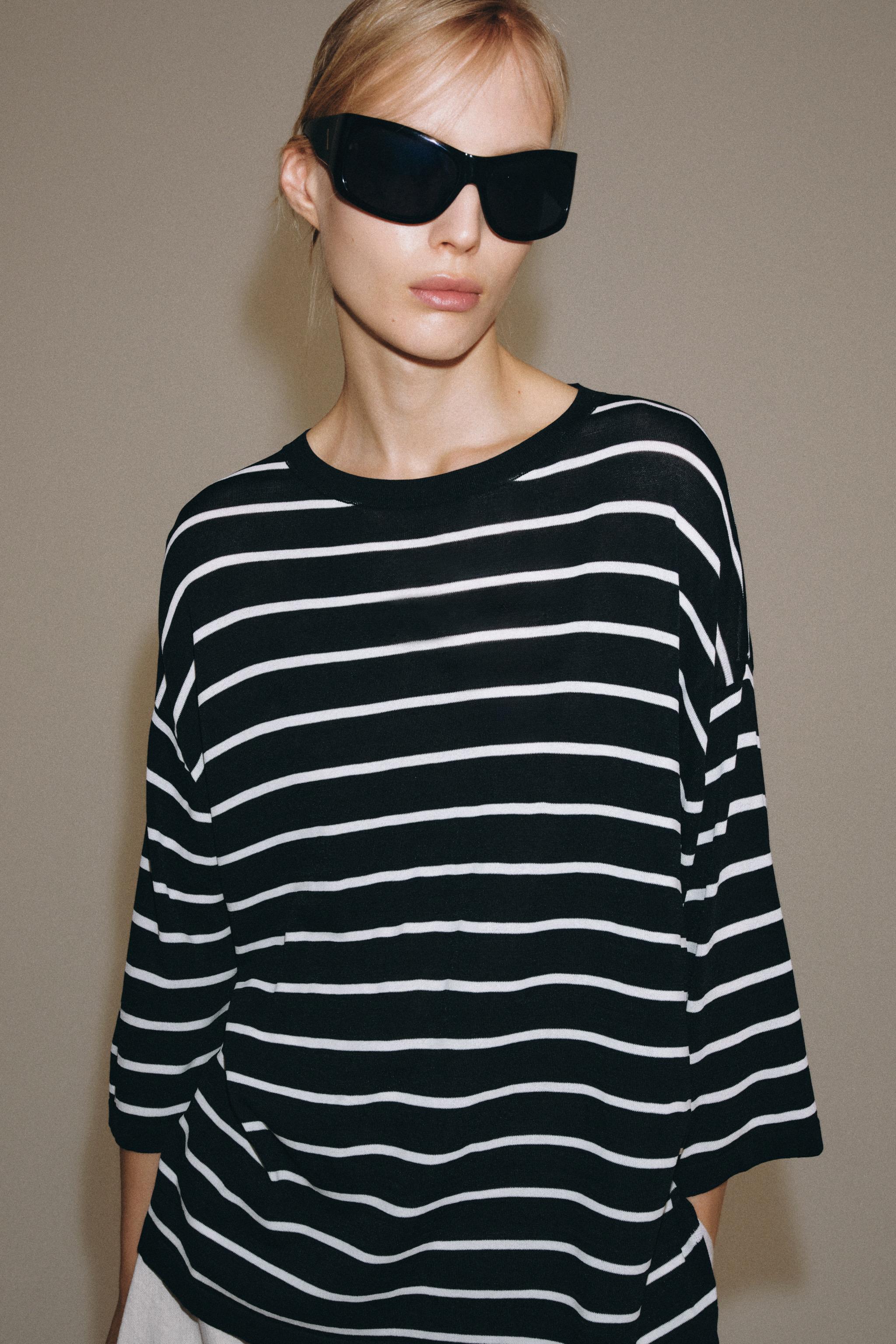 THREE-QUARTER SLEEVE KNIT TOP