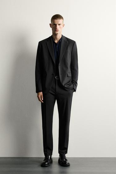 بنطلون بدلة مريح بقصة ضيقة - أسود by Zara