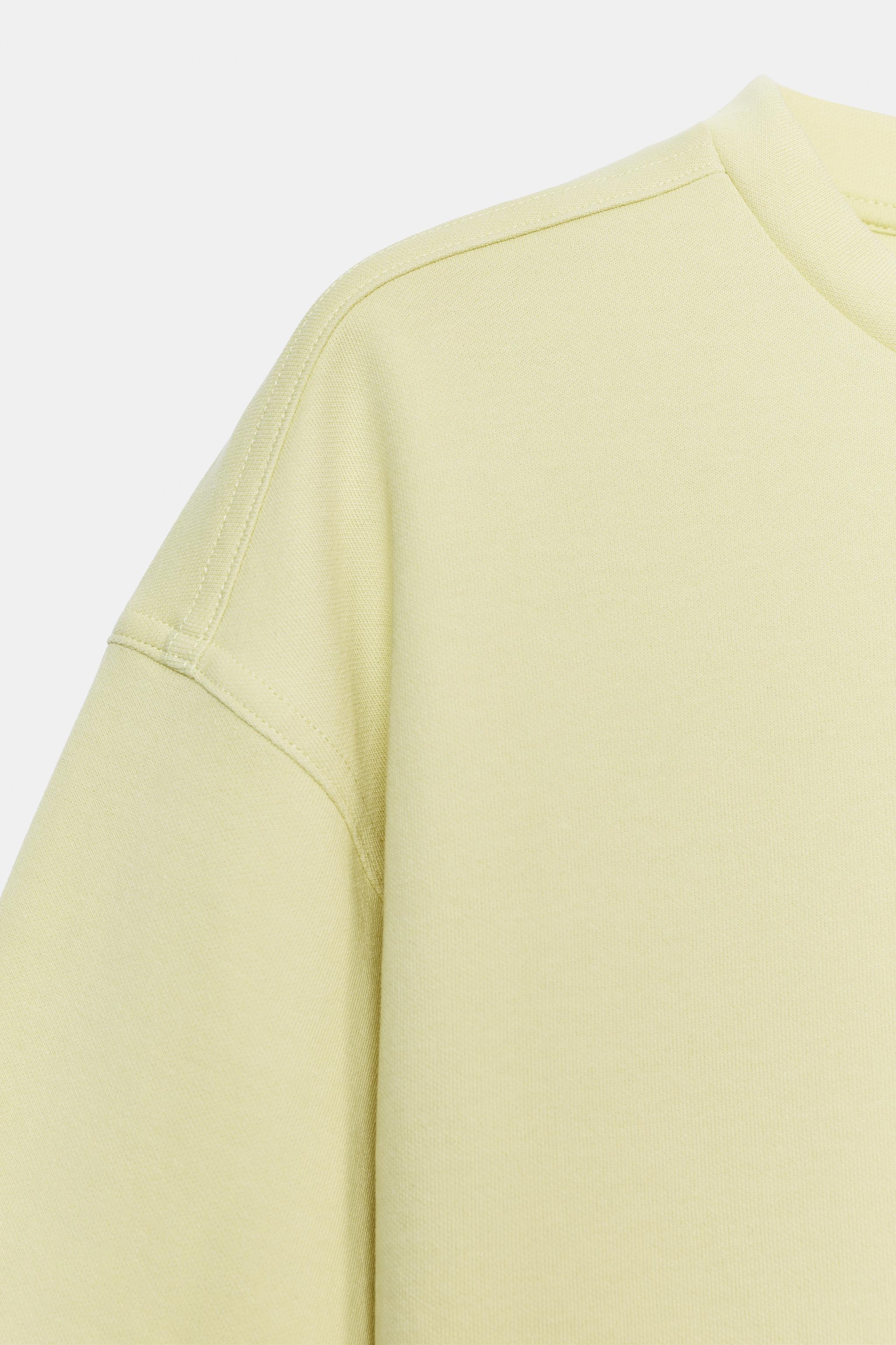 T-SHIRT INTERLOCK À OUVERTURES