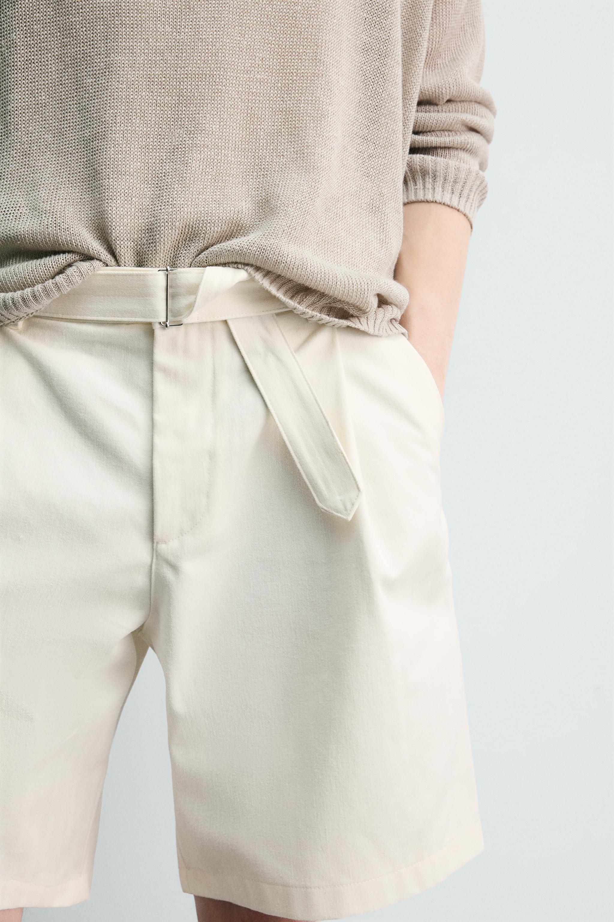 RELAXED FIT PLEATED BELTED SHORTS