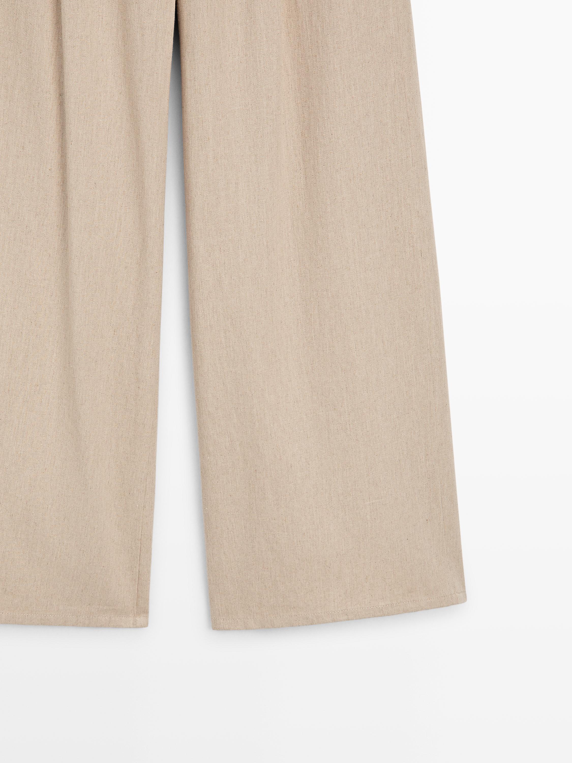 Loose fit high-waist trousers