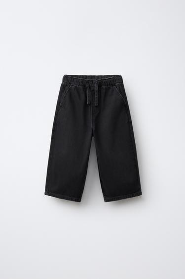 JEANS HOLGADO CON CORDÓN EN CINTURA