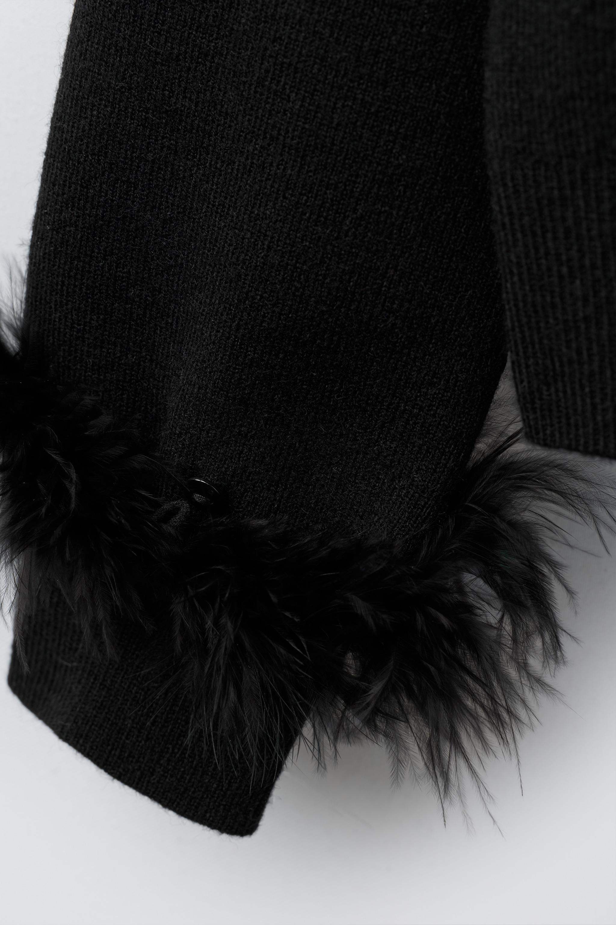 GILET EN MAILLE PLUMES DÉTACHABLES