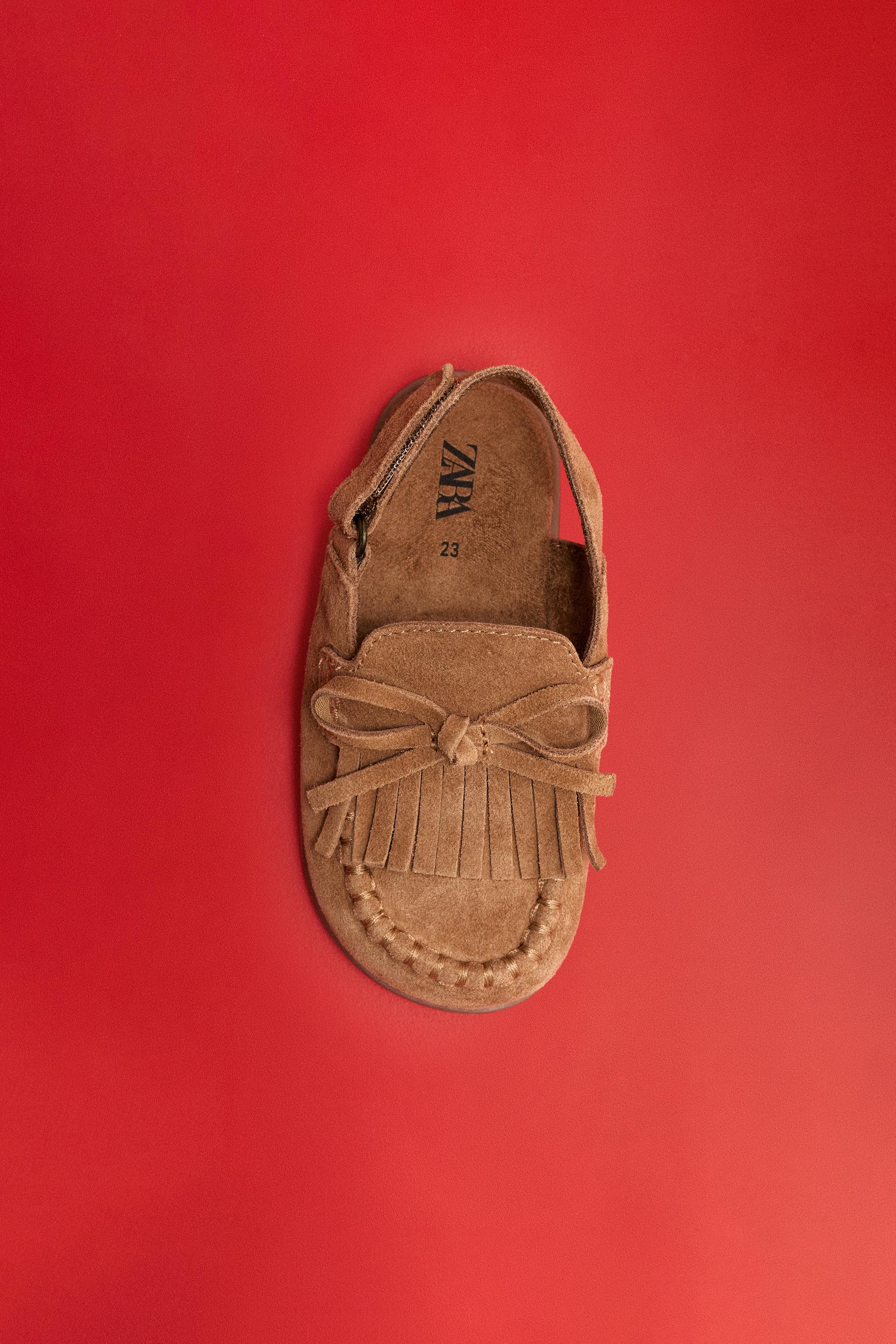 SABOTS EN CUIR PIEDS NUS