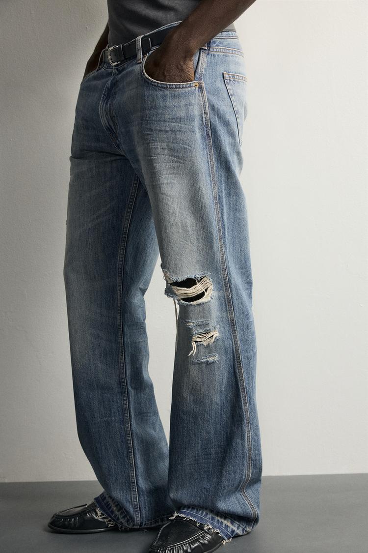 JEANS DE CINTURA BAJA CON ROTURAS Y PIERNA ACAMPANADA 5