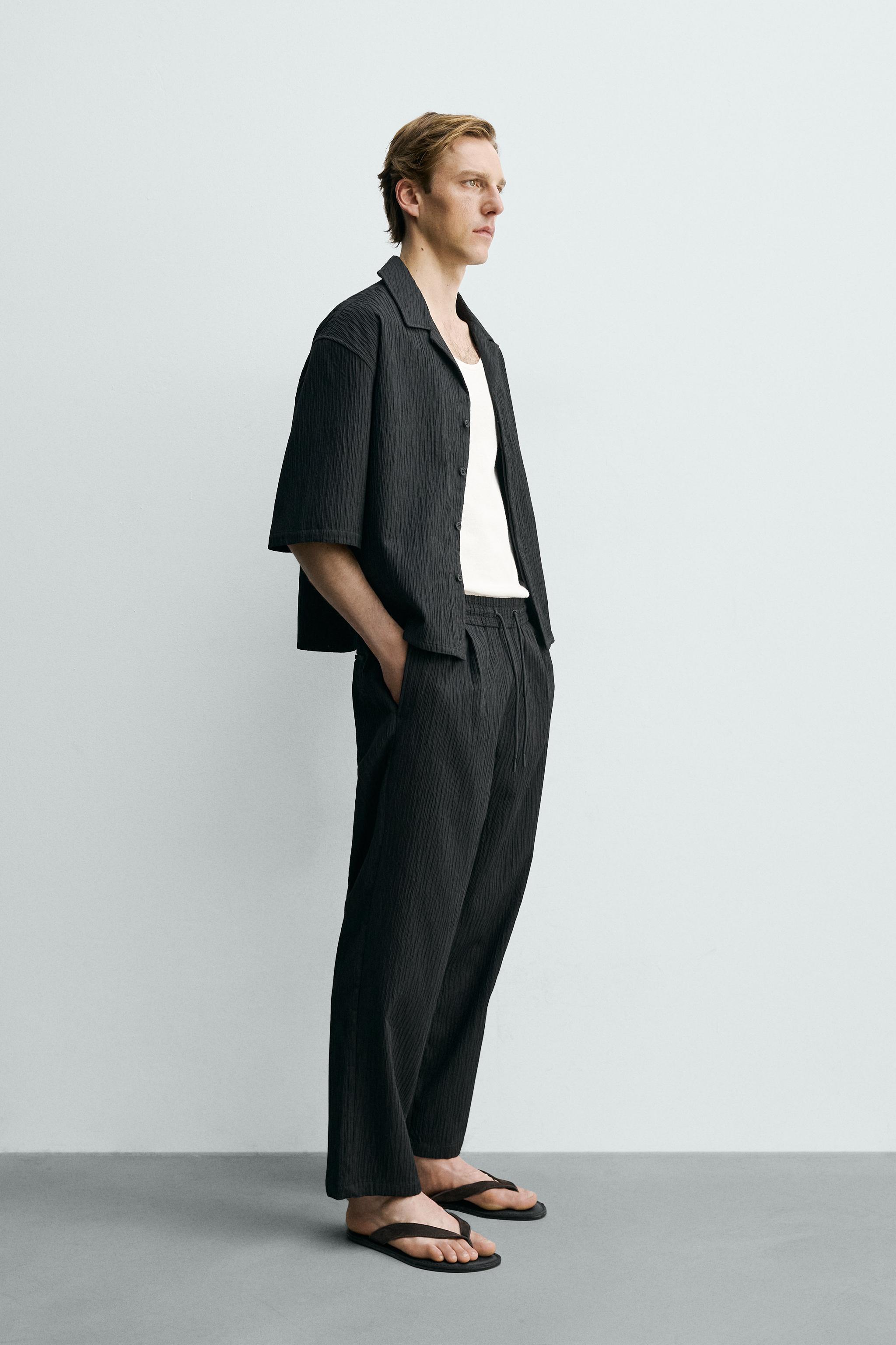 RELAXED FIT EMBOSSED TROUSERS - Black | ZARA Singapore