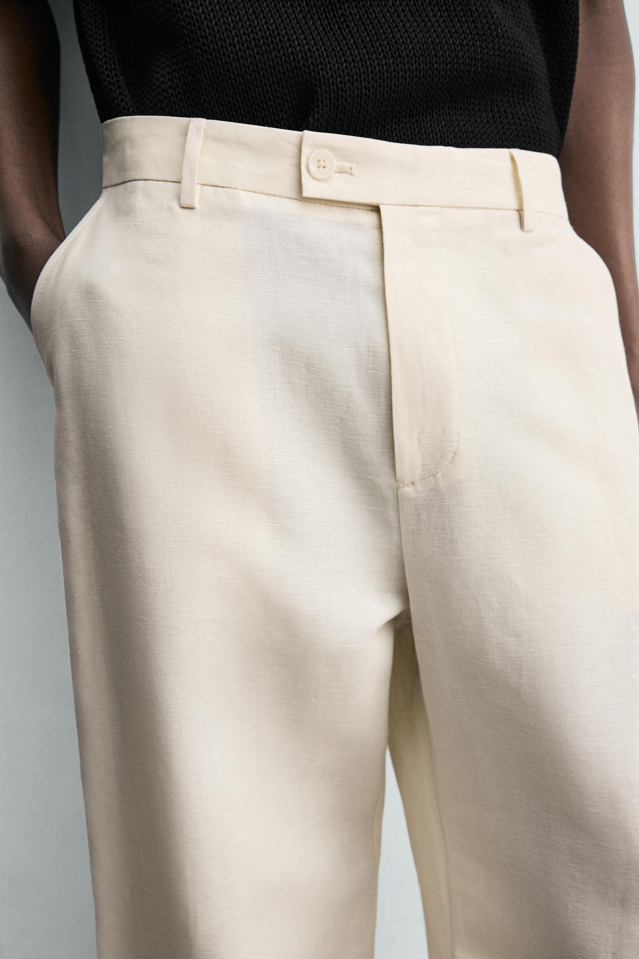 PANTALON COUPE DÉCONTRACTÉE À PLIS